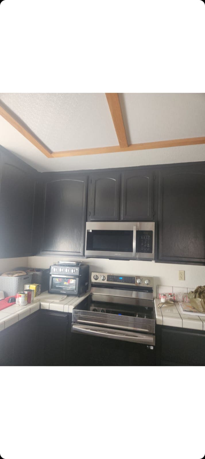 Dark refinished kitchen cabinets